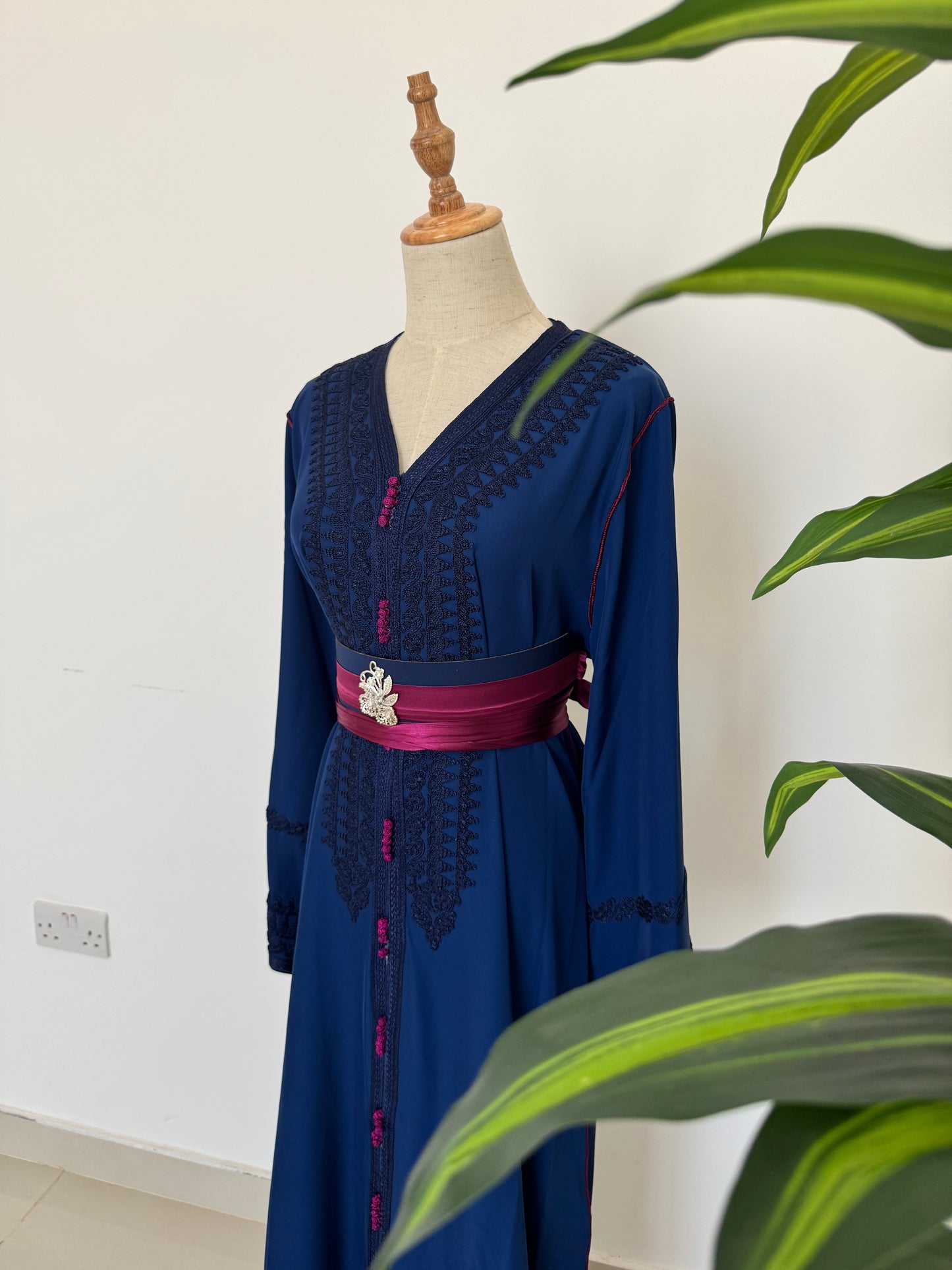 Elegant Navy Blue Kaftan with Traditional Design and Pink Waist Belt
