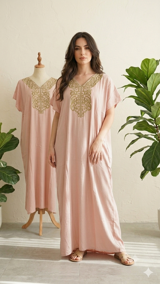 A sleeveless house dress made of cool cotton fabric, perfect for summer.